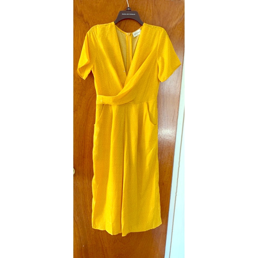 Culotte jumpsuit size L runs small.